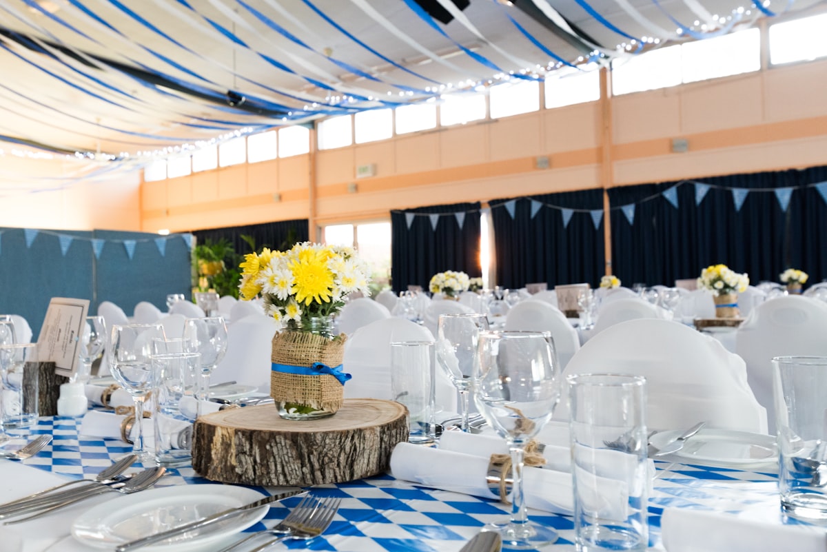 Elegant event table setting with flowers and place settings